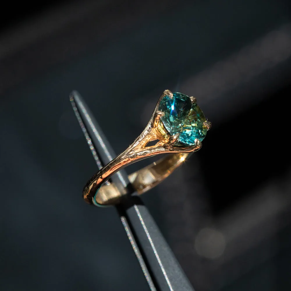 2.40ct Oval Teal Green Parti Sapphire Evergreen Carved Split Shank Six Prong Ring in 14k Yellow Gold