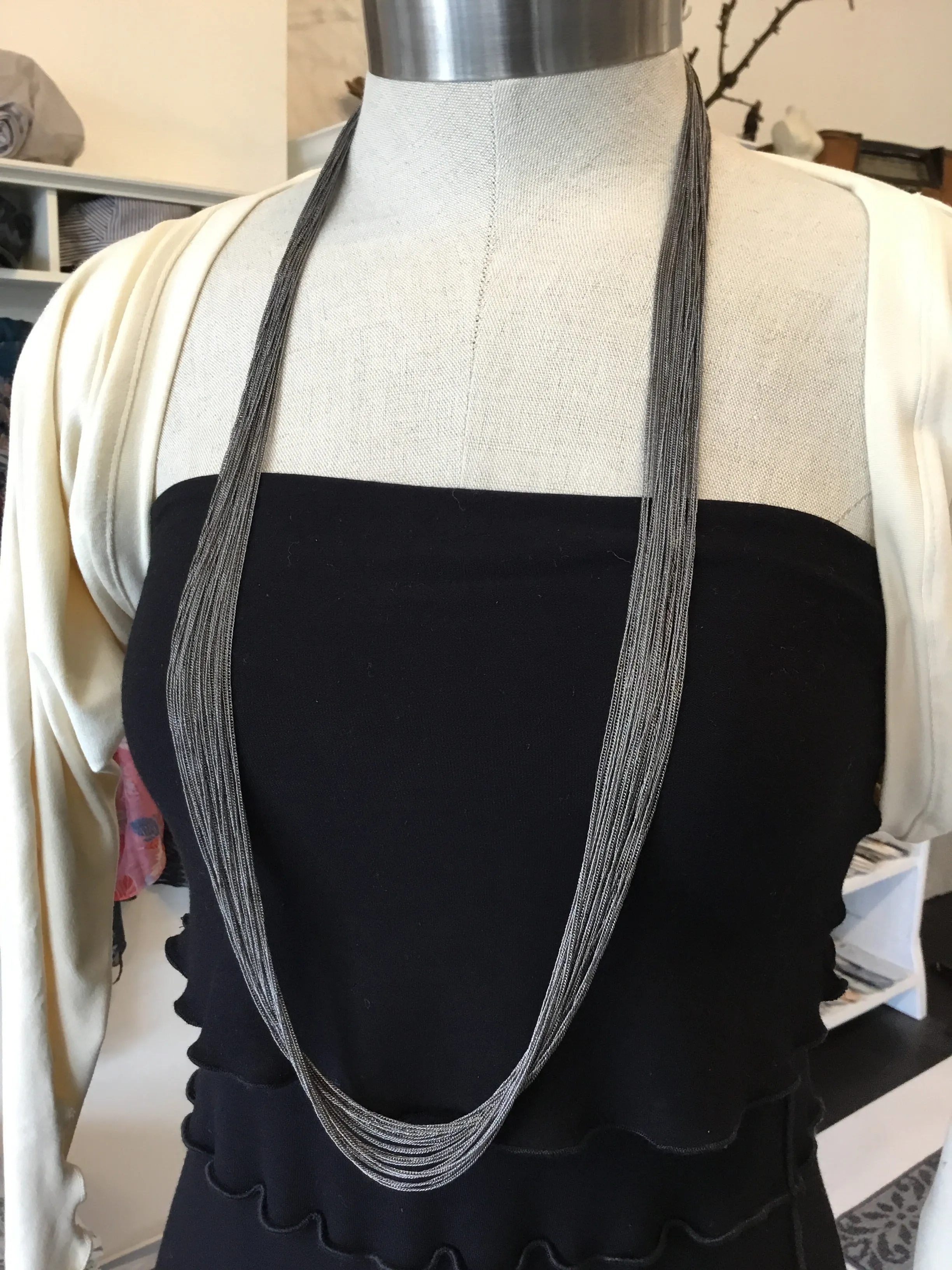Multi chain long necklaces