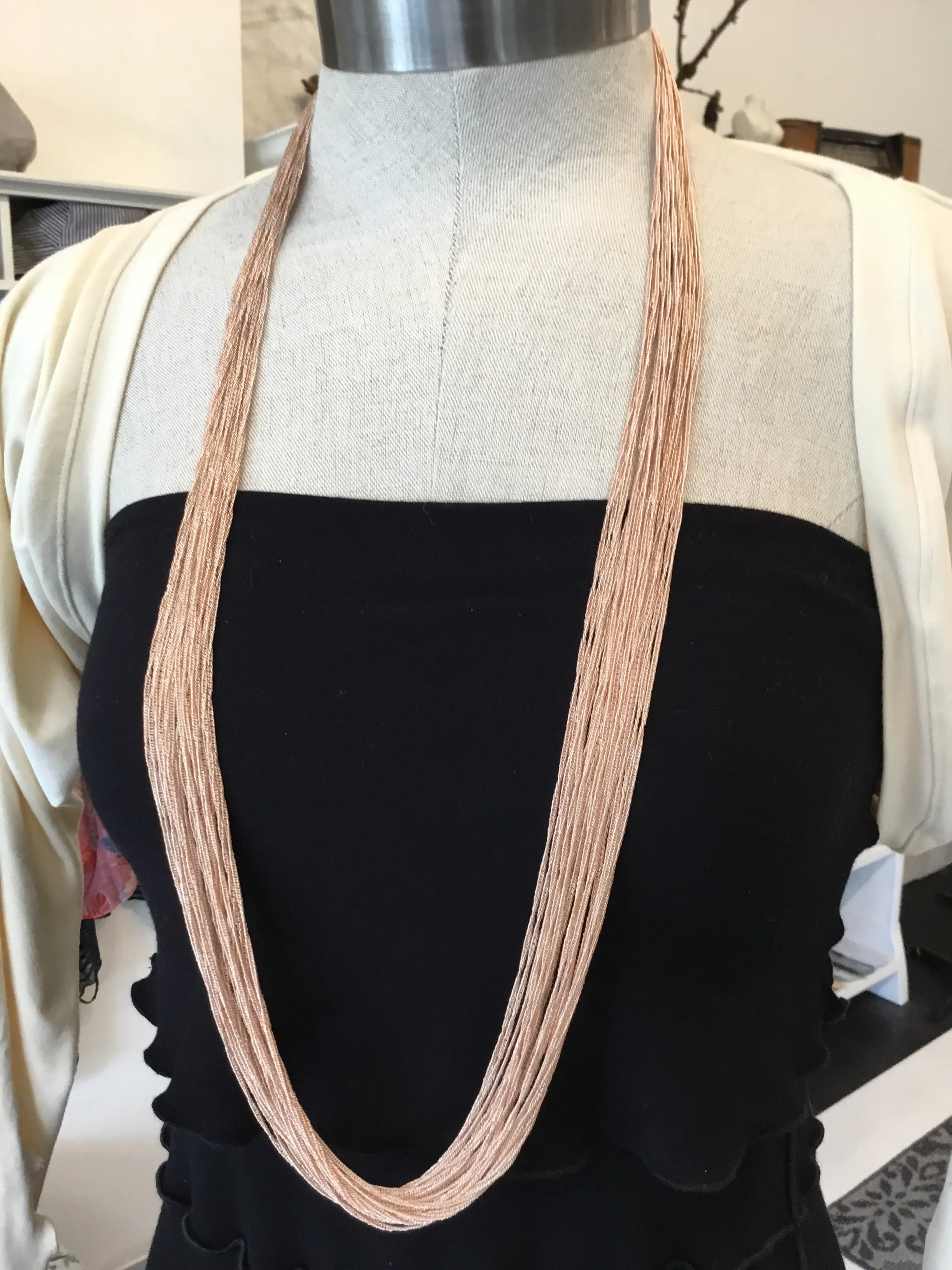 Multi chain long necklaces