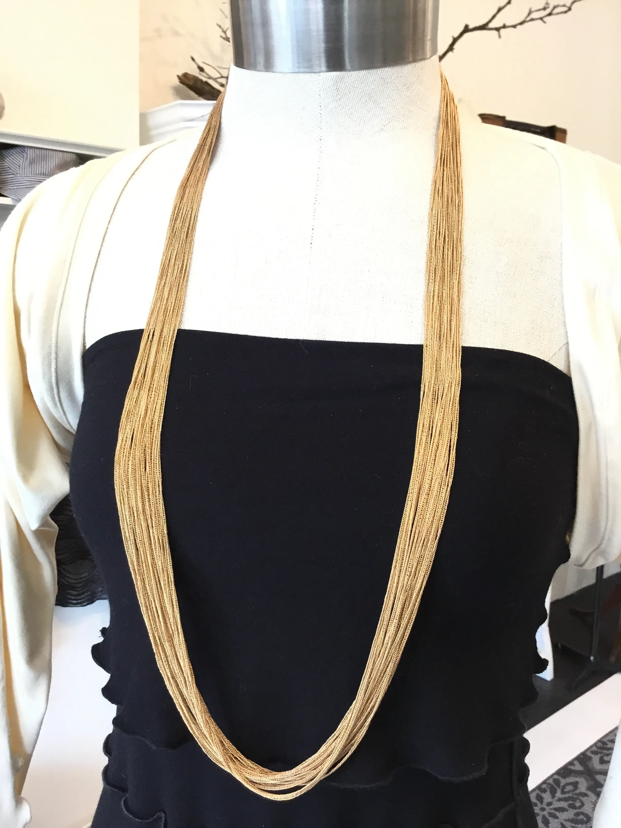 Multi chain long necklaces