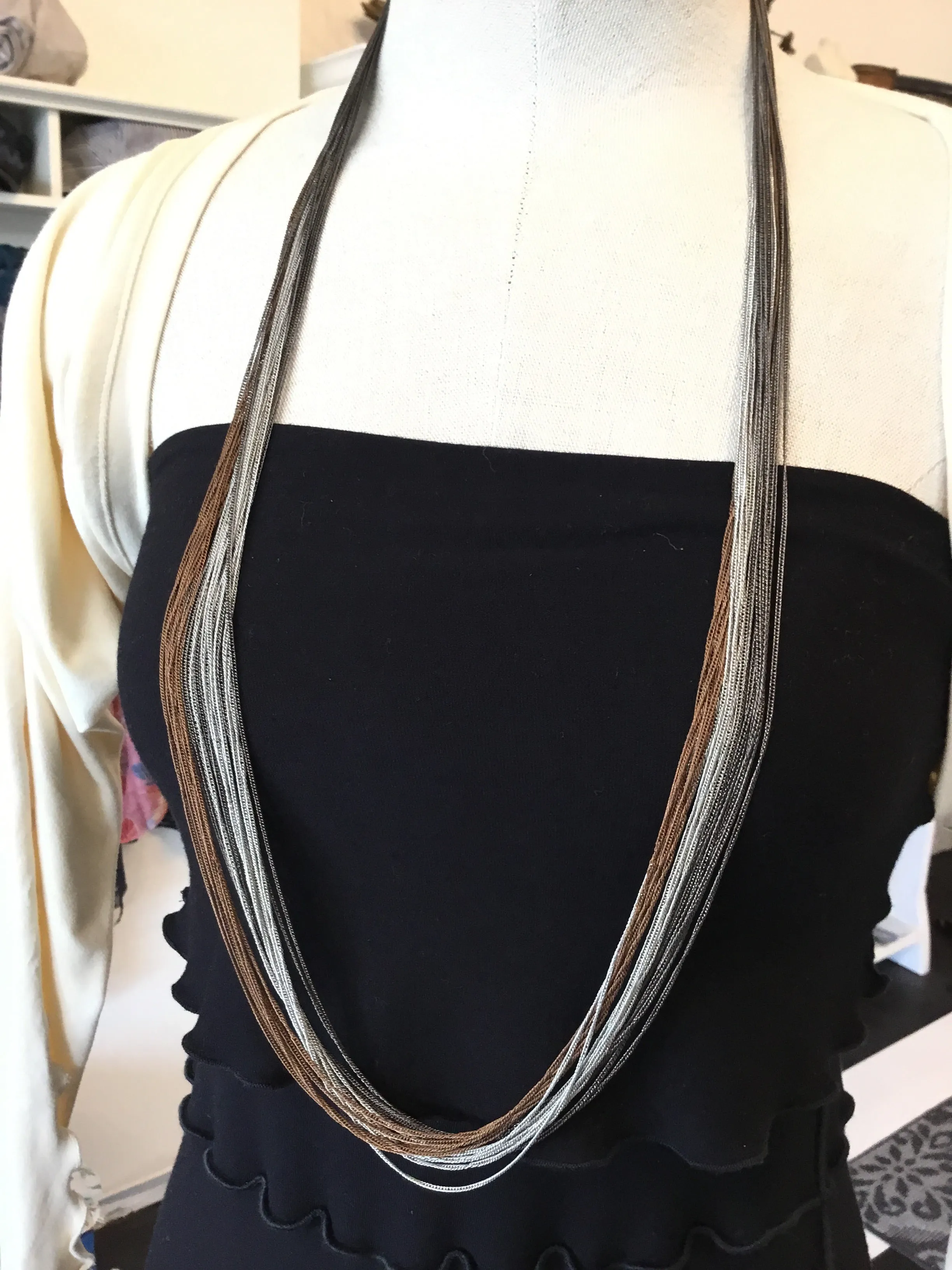Multi chain long necklaces
