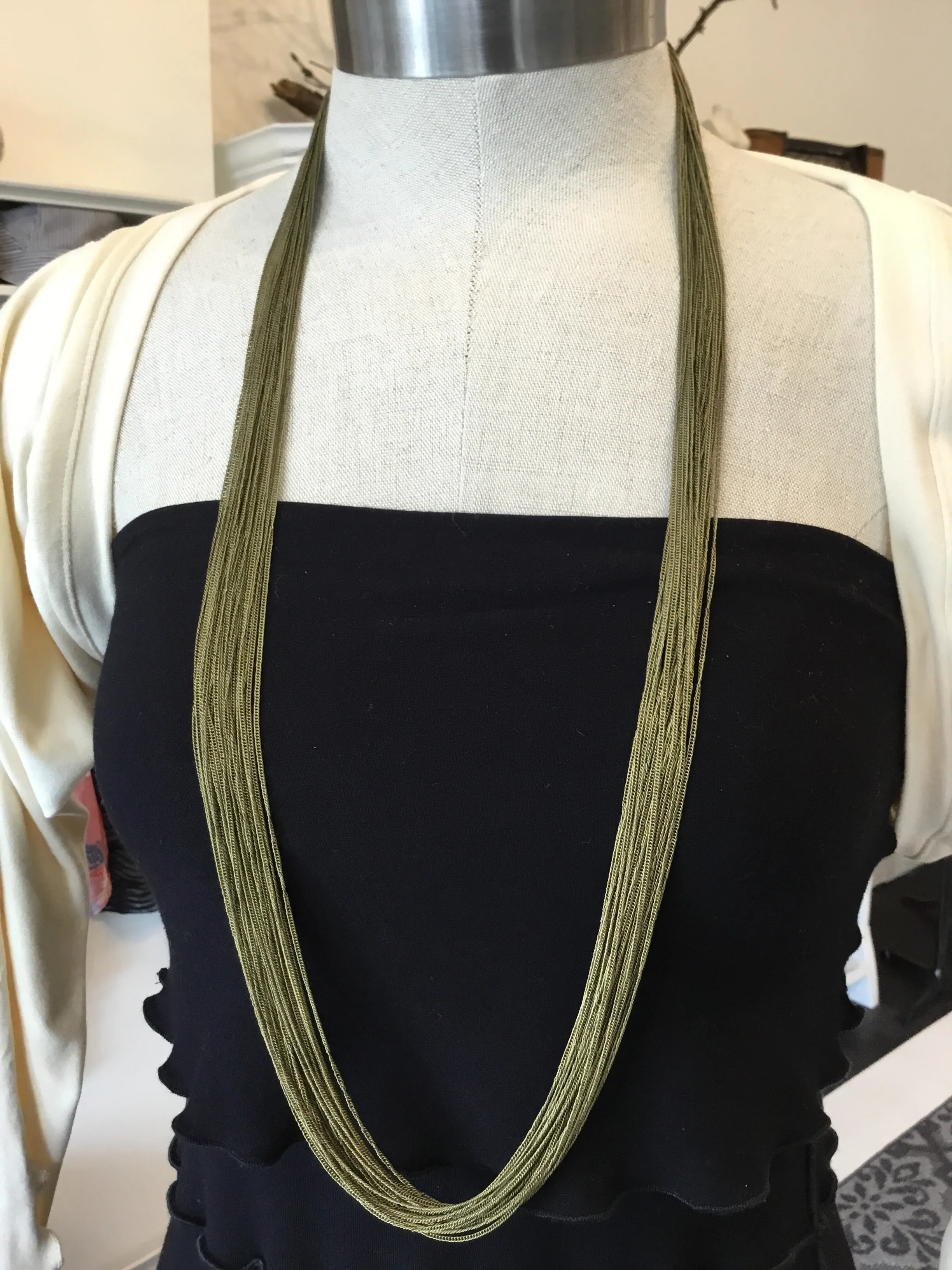 Multi chain long necklaces