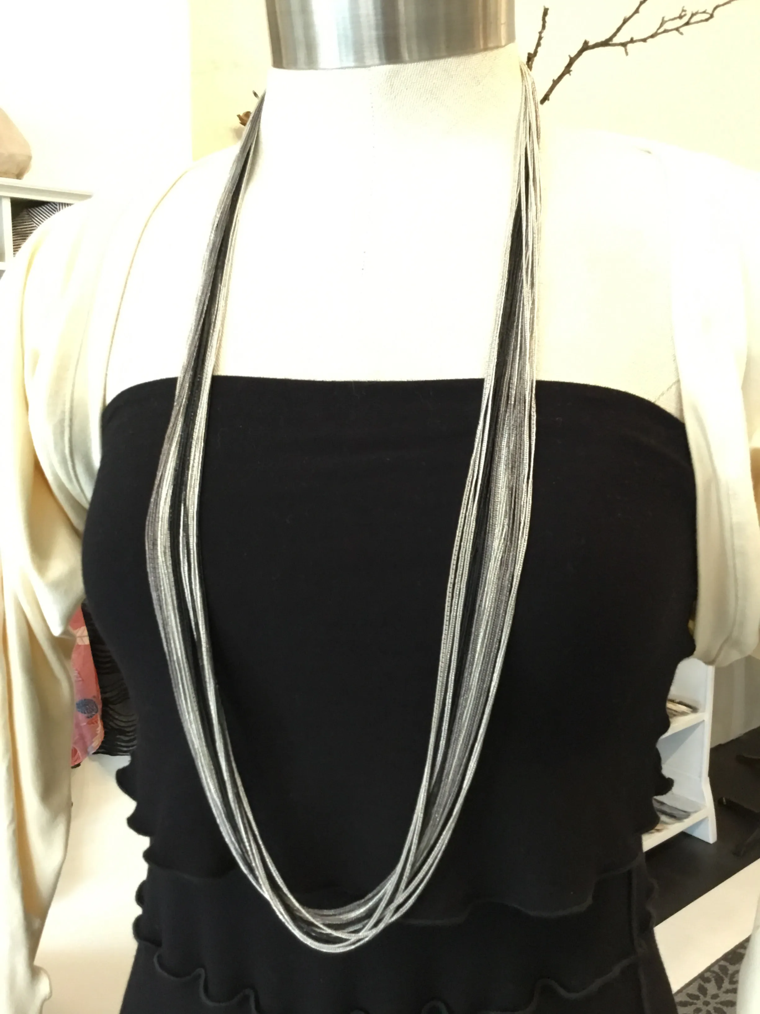 Multi chain long necklaces
