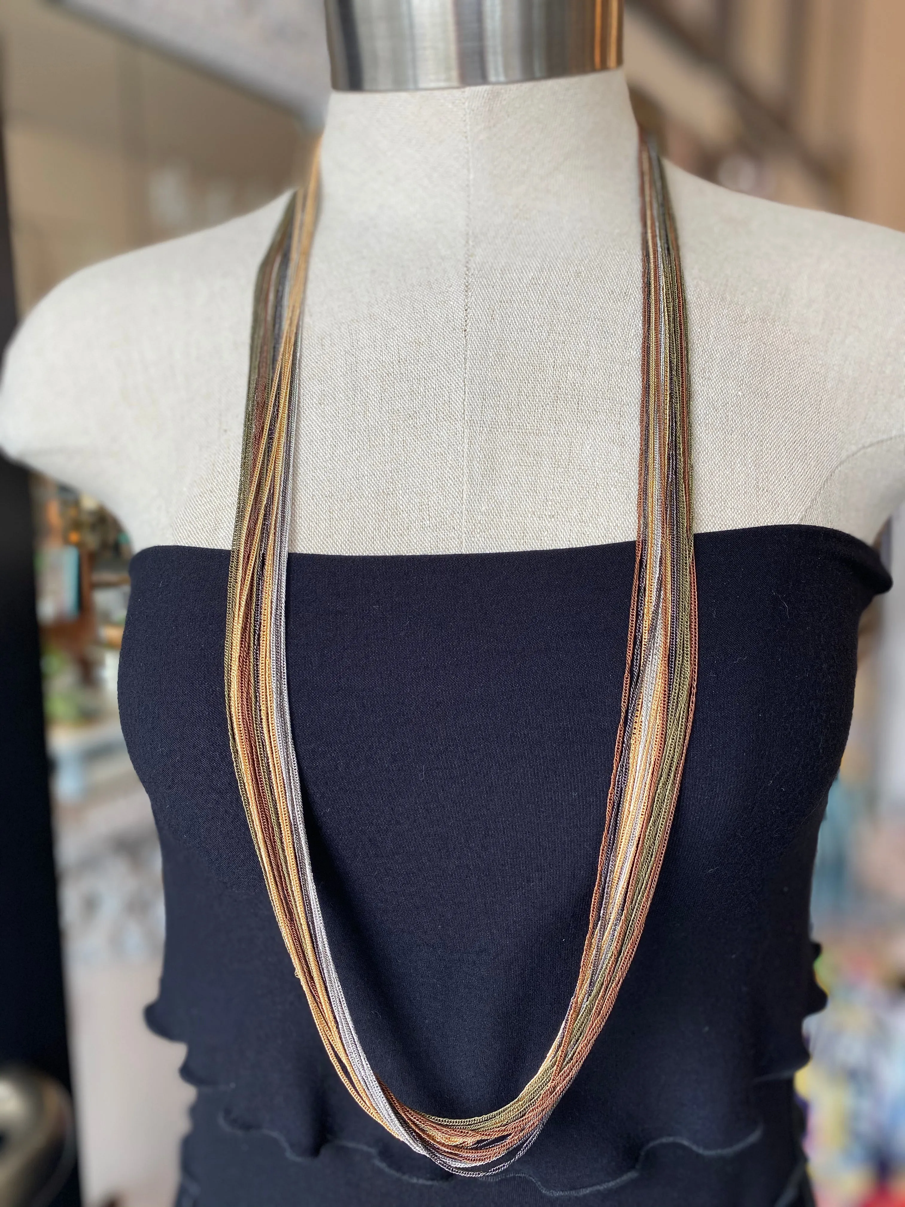 Multi chain long necklaces