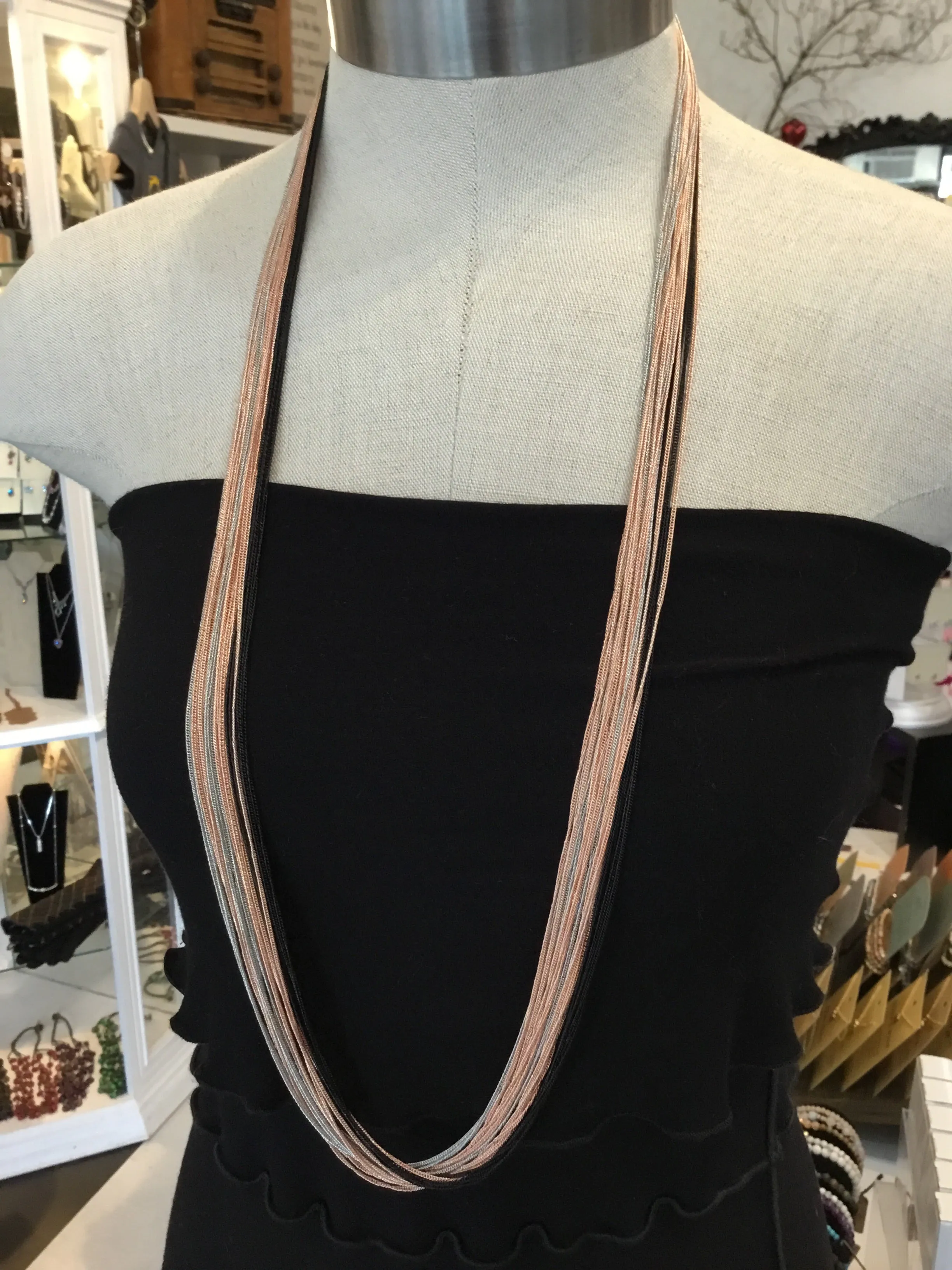 Multi chain long necklaces