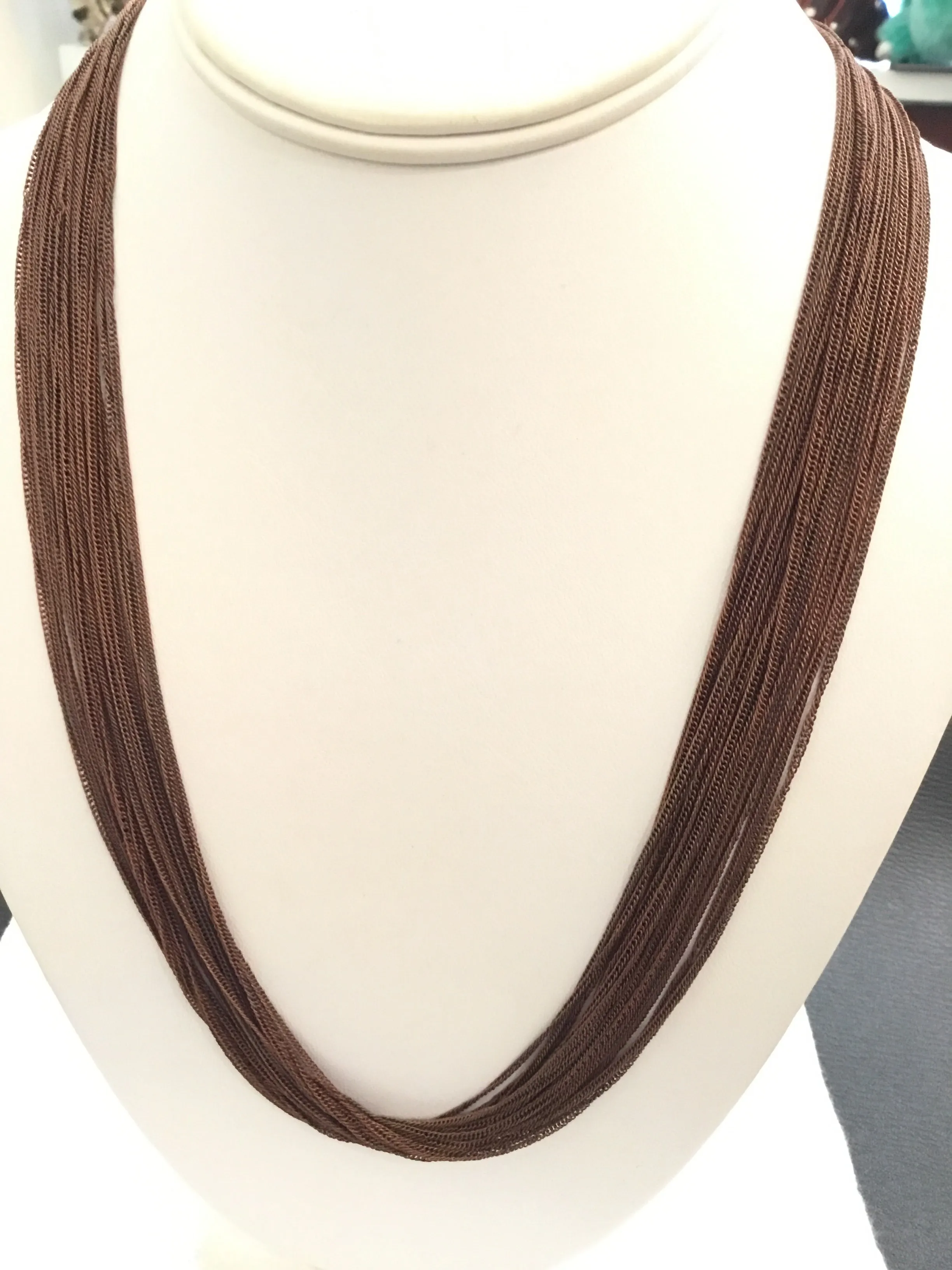 Multi chain long necklaces