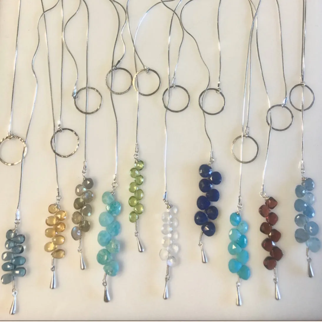 Raindrop lariat in gemstones