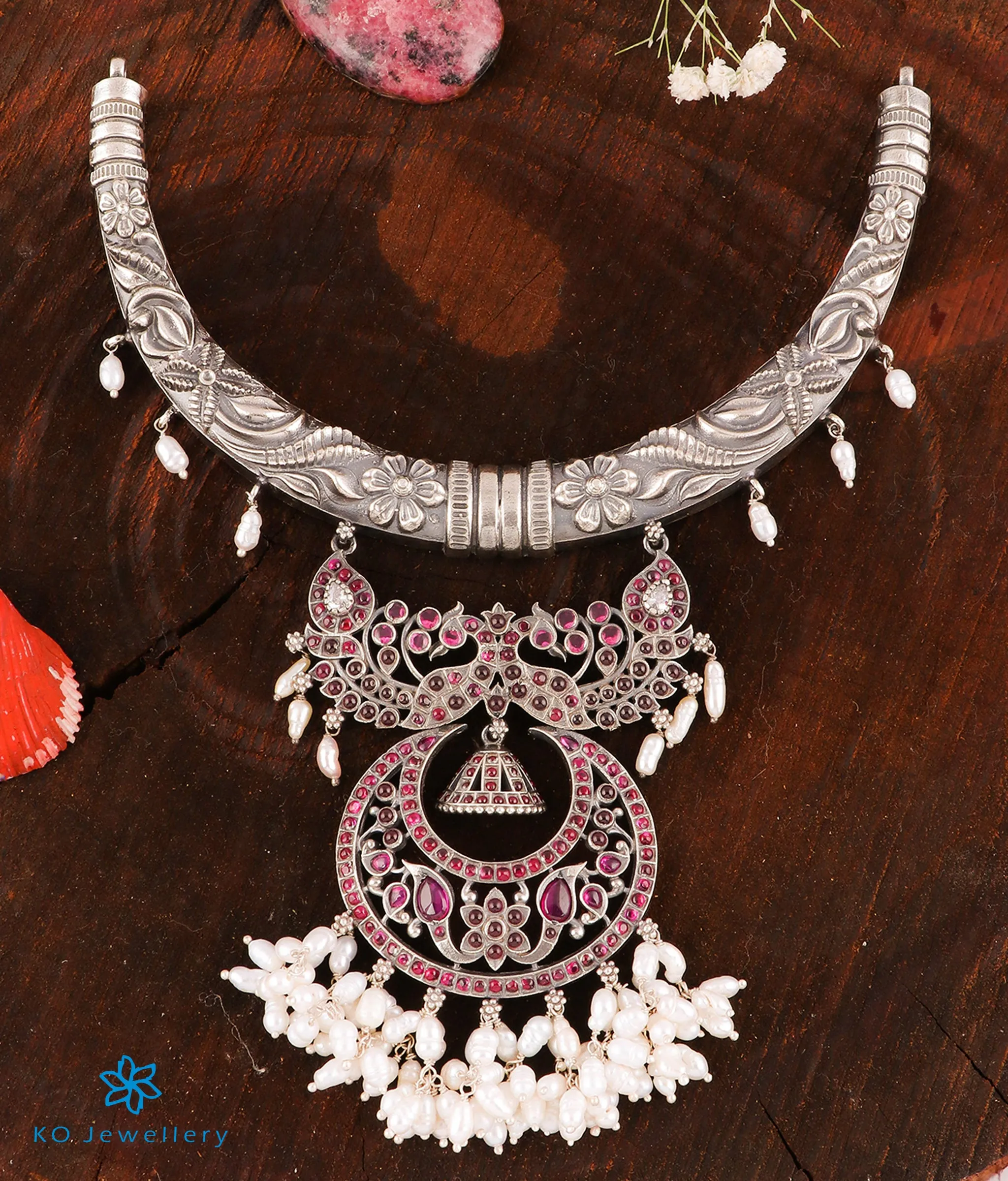 The Rutvi Silver Peacock Hasli Necklace